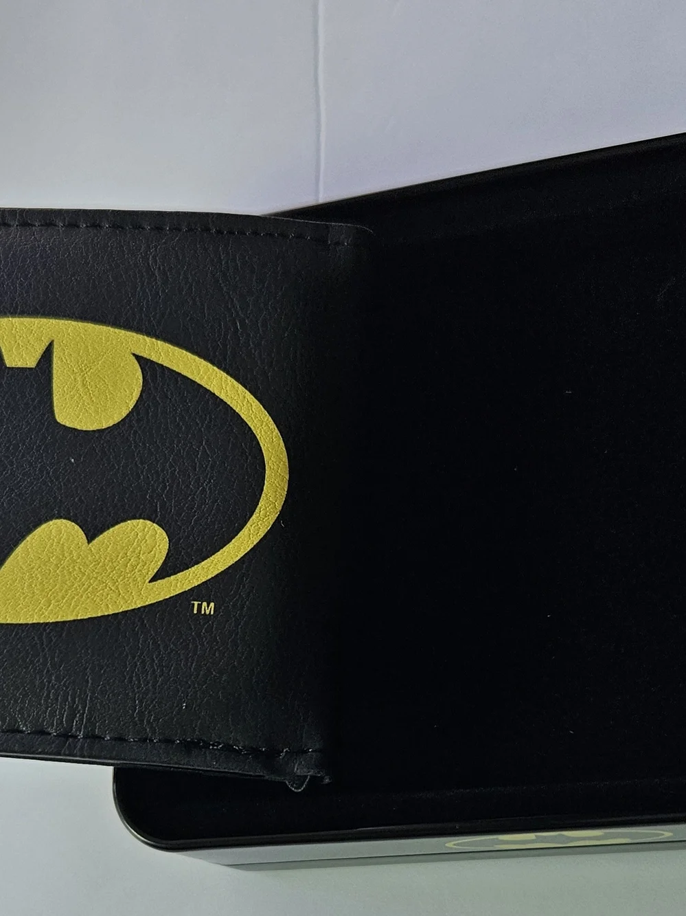 officially licensed DC Comics Batman Bifold Wallet resting inside its protective